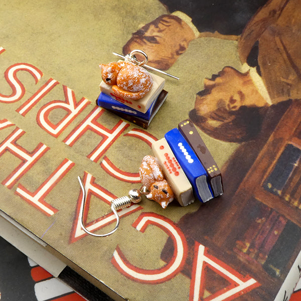 Stack of Books with Cat Earrings